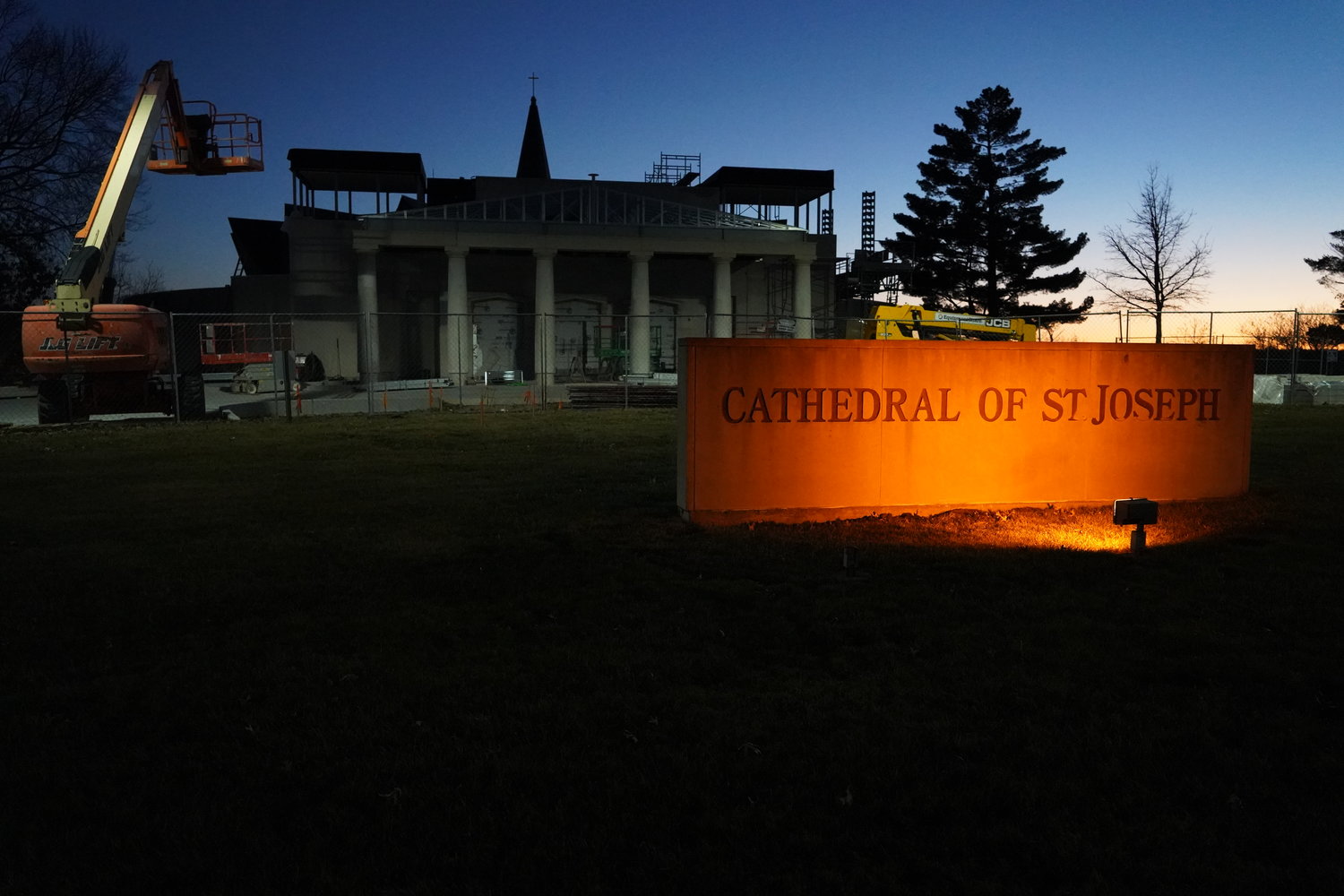 The Cathedral of St. Joseph is seen at sunset on Feb. 10, showing progress on its expanded narthex, bell towers and columned porte cochere, all designed to help provide a more dignified, more welcoming environment for the Cathedral. Bishop W. Shawn McKnight has set May 5 as the rededication date for the Cathedral, following an 16-month renovation and renewal.